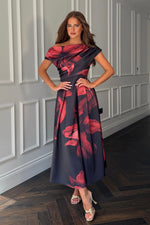 Load image into Gallery viewer, Betty Asymmetric Neckline Skater Midi Black Floral
