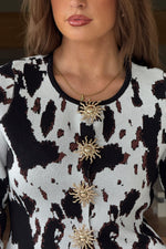 Load image into Gallery viewer, Haddie Cow Print Knited Cardigan
